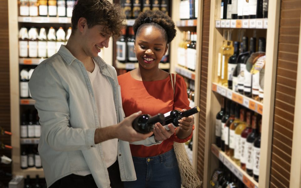 man-woman-shopping-grocery-store